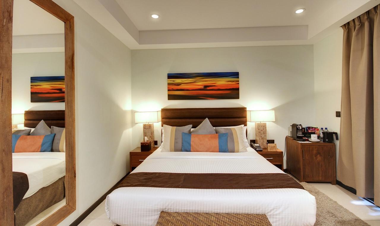 Executive Superior Room Return Airport Transfer on Food & Beverage Complimentary Gym Access